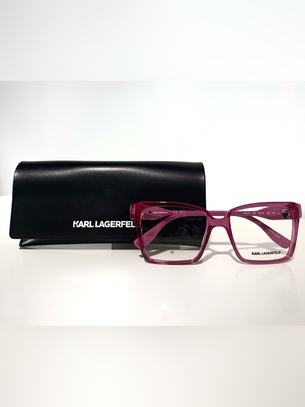 Karl Lagerfeld Women’s Translucent Magenta Square Sunglasses